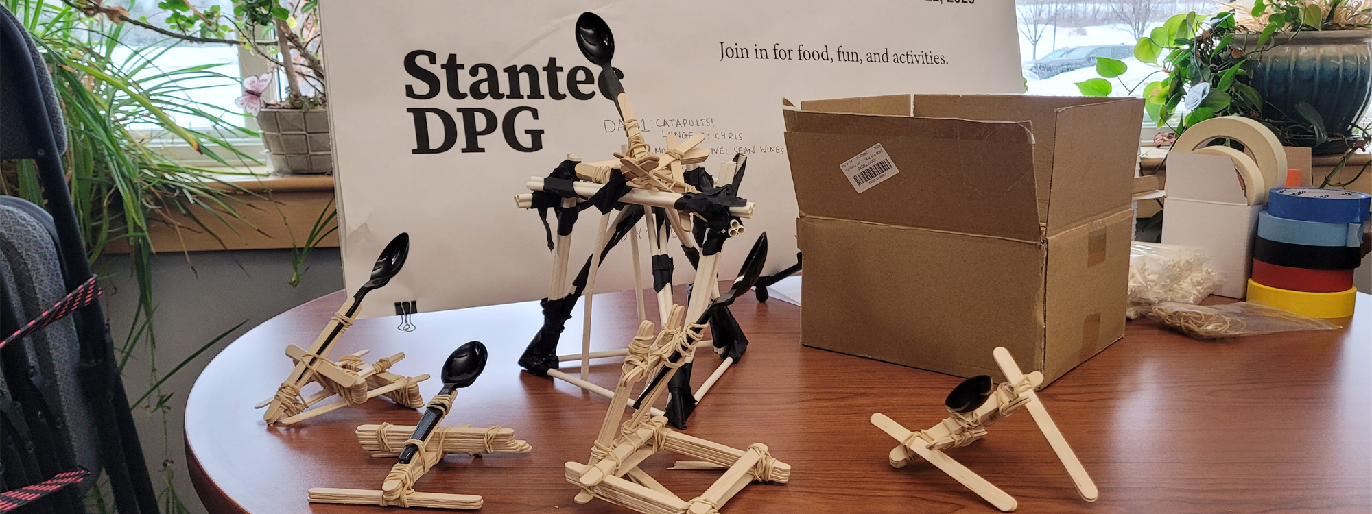 Catapults made from popsicle sticks in the Stantec office